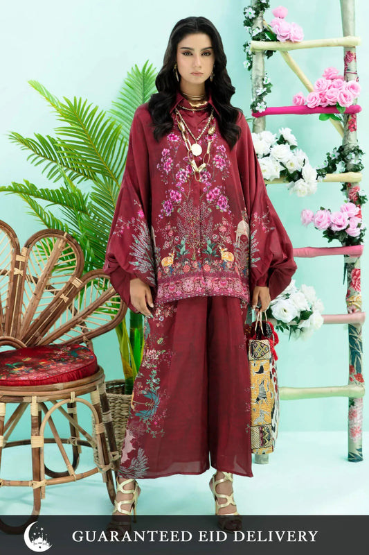 Model wearing rich burgundy FLORAL FLARE dress by Musferah Saad, adorned with intricate embroidery, ideal for Eid in the UK.