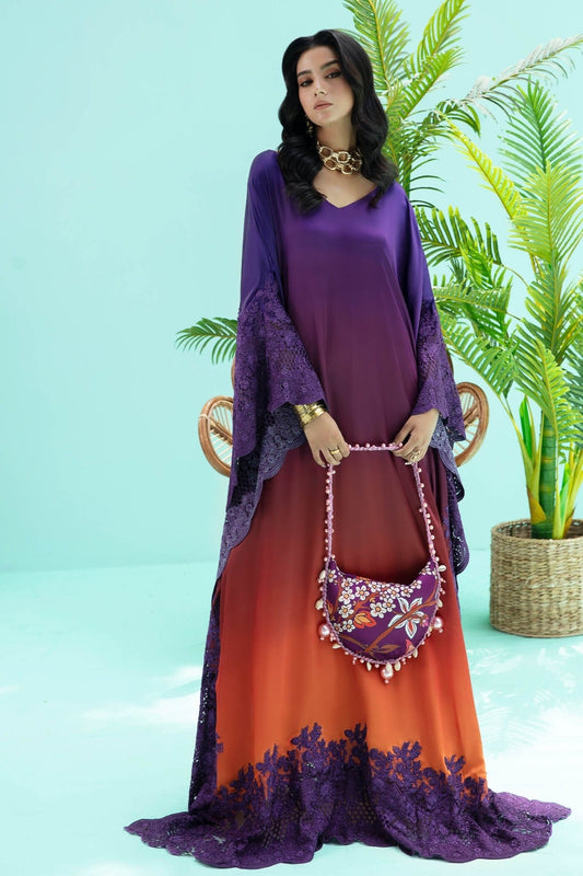 Model wearing purple and rust OMBRE ELEGANCE dress from Musferah Saad's Resort collection '24, showcasing Pakistani clothes online in the UK.