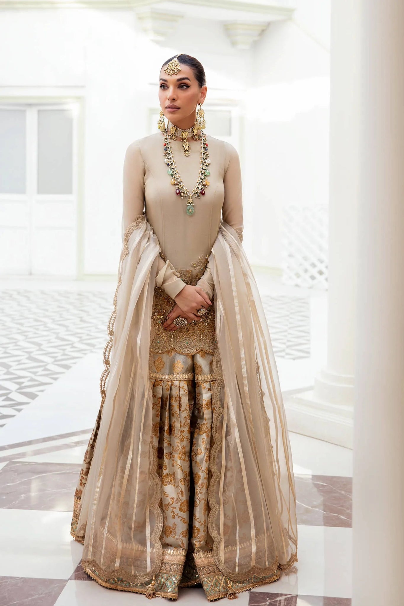 Model wearing Symphony's MAJESTIC OPULENCE , an equisite mold by Musferah Saad UK, Pakistani Clothes UK.