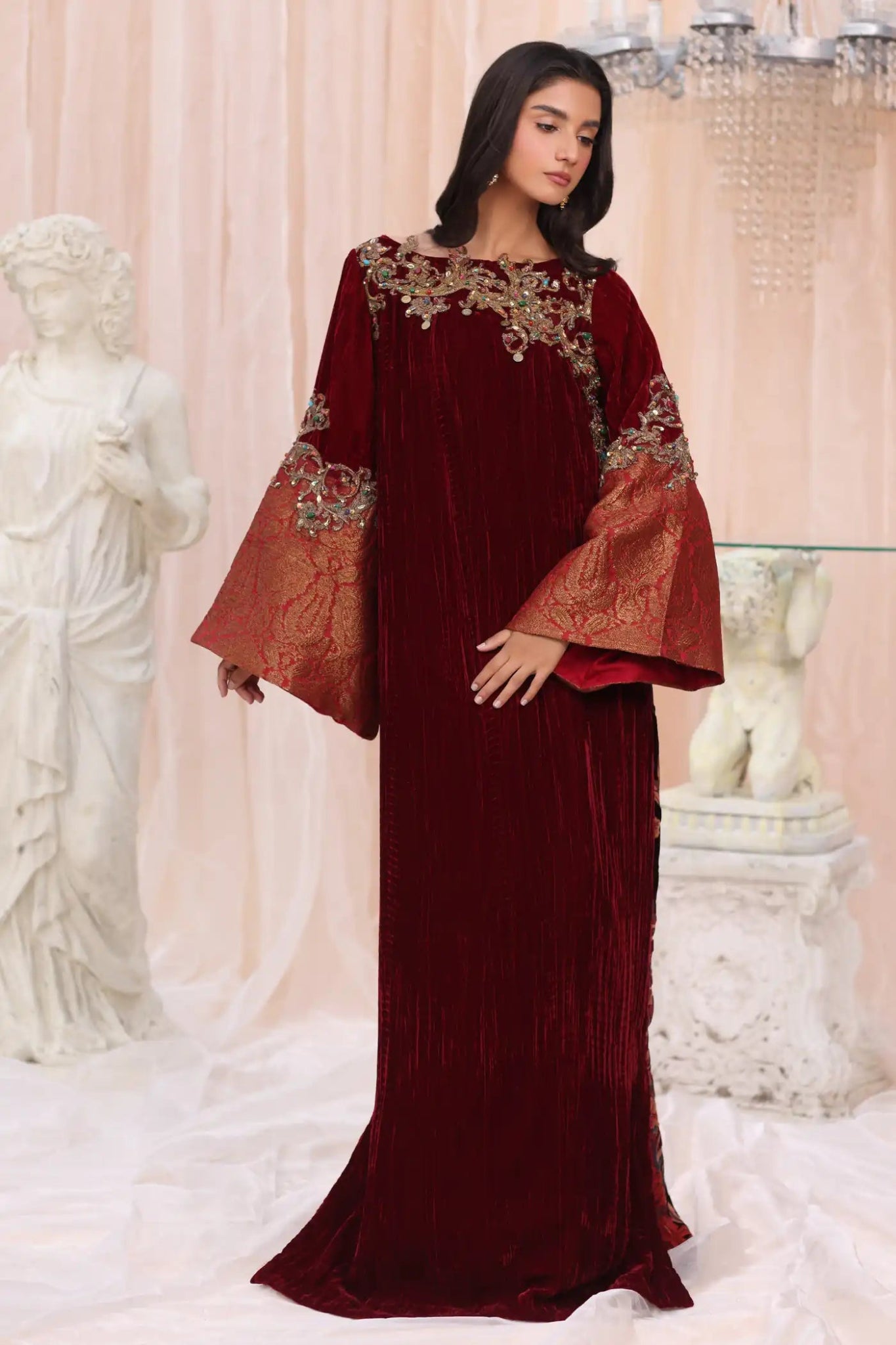 Model wearing Crimson Flame from Musferah Saad's The Serenade collection in deep red, ideal for weddings. Pakistani clothes online in UK at Signature Labels.