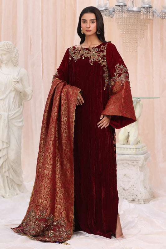 Model wearing Crimson Flame from Musferah Saad's The Serenade collection in deep red, ideal for weddings. Pakistani clothes online in UK at Signature Labels.