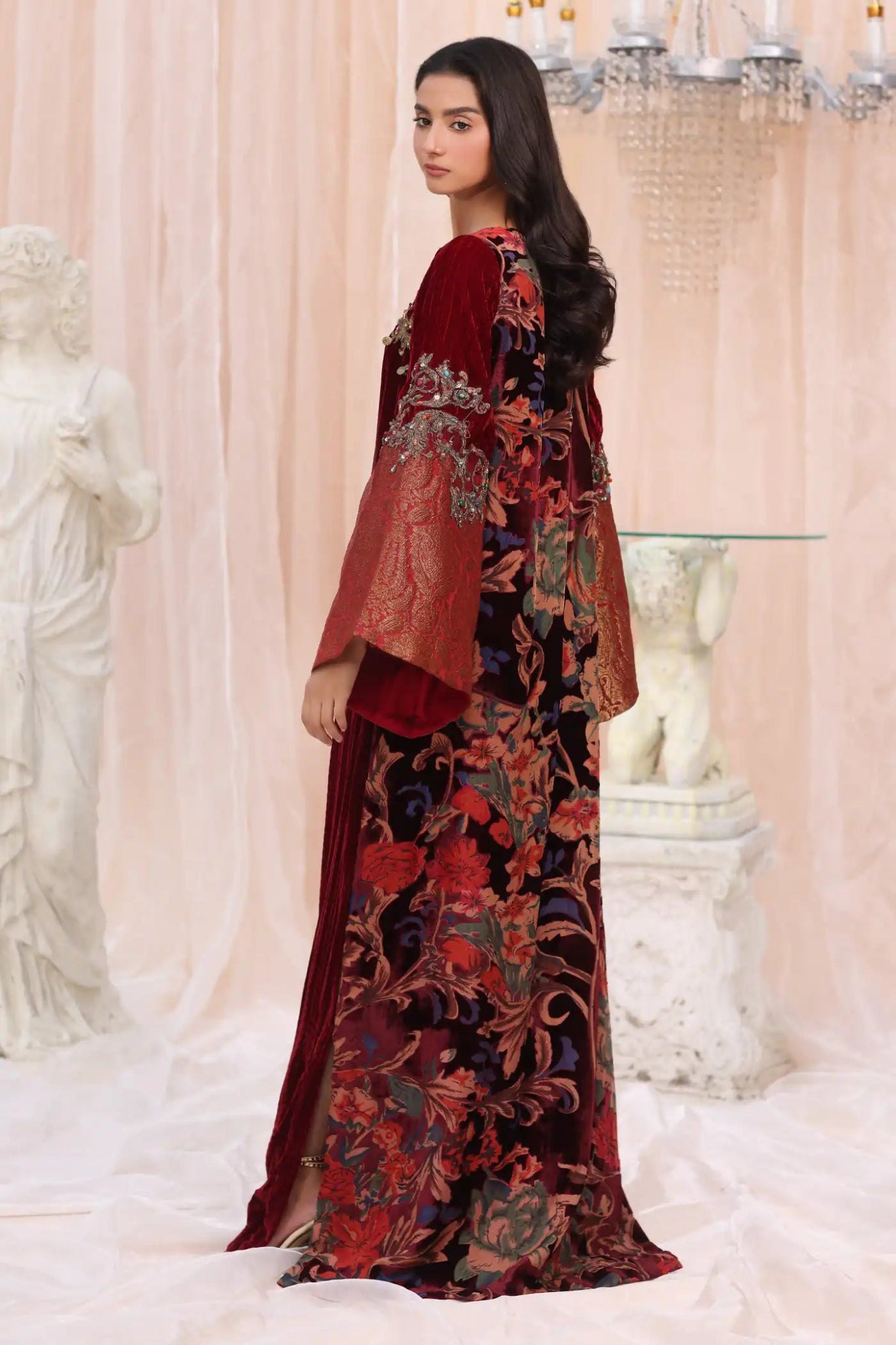 Model wearing Crimson Flame from Musferah Saad's The Serenade collection in deep red, ideal for weddings. Pakistani clothes online in UK at Signature Labels.