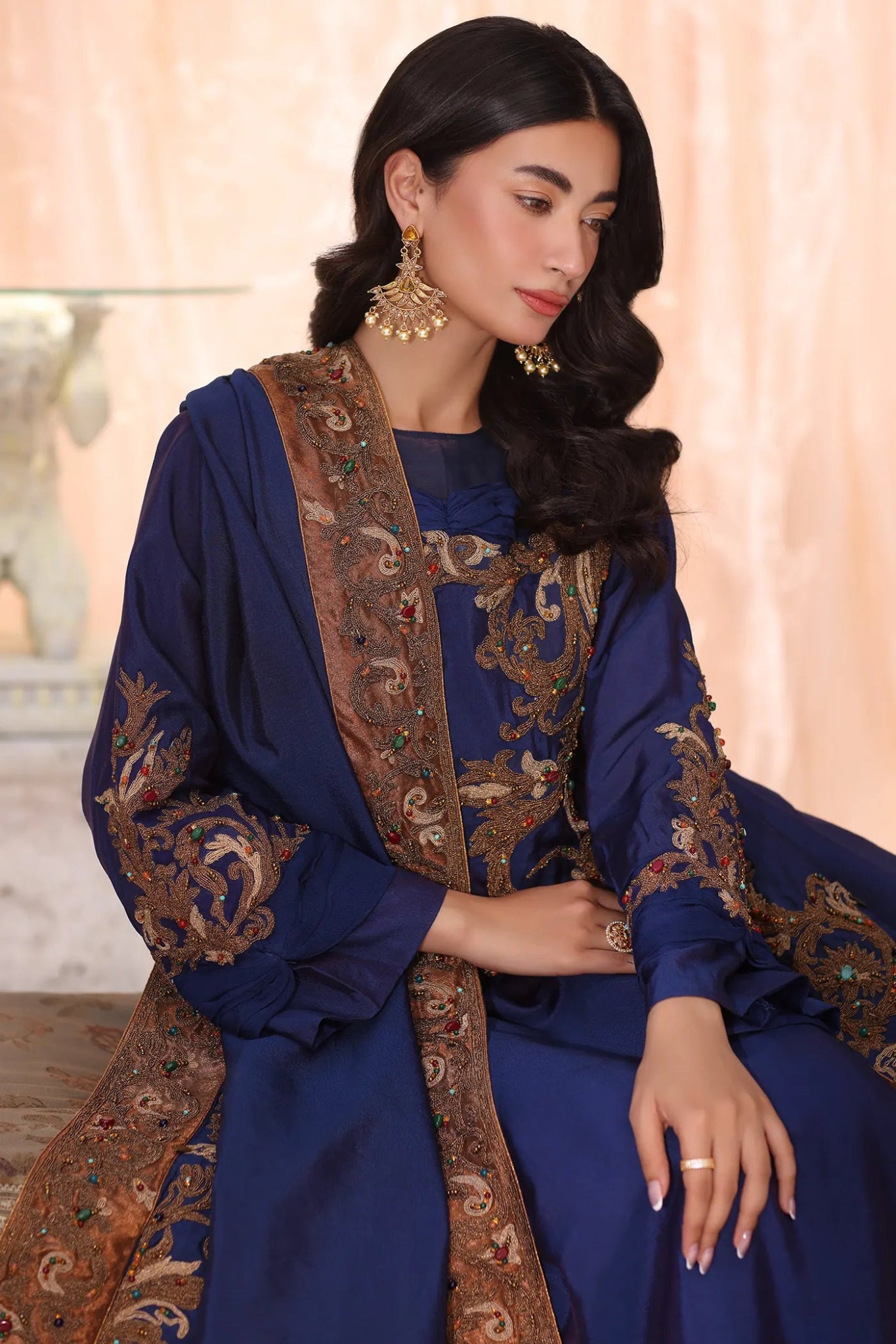 Model wearing Sapphire Empress from Musferah Saad's The Serenade collection, featuring elegant blue hues. Pakistani clothes online in UK at Signature Labels.