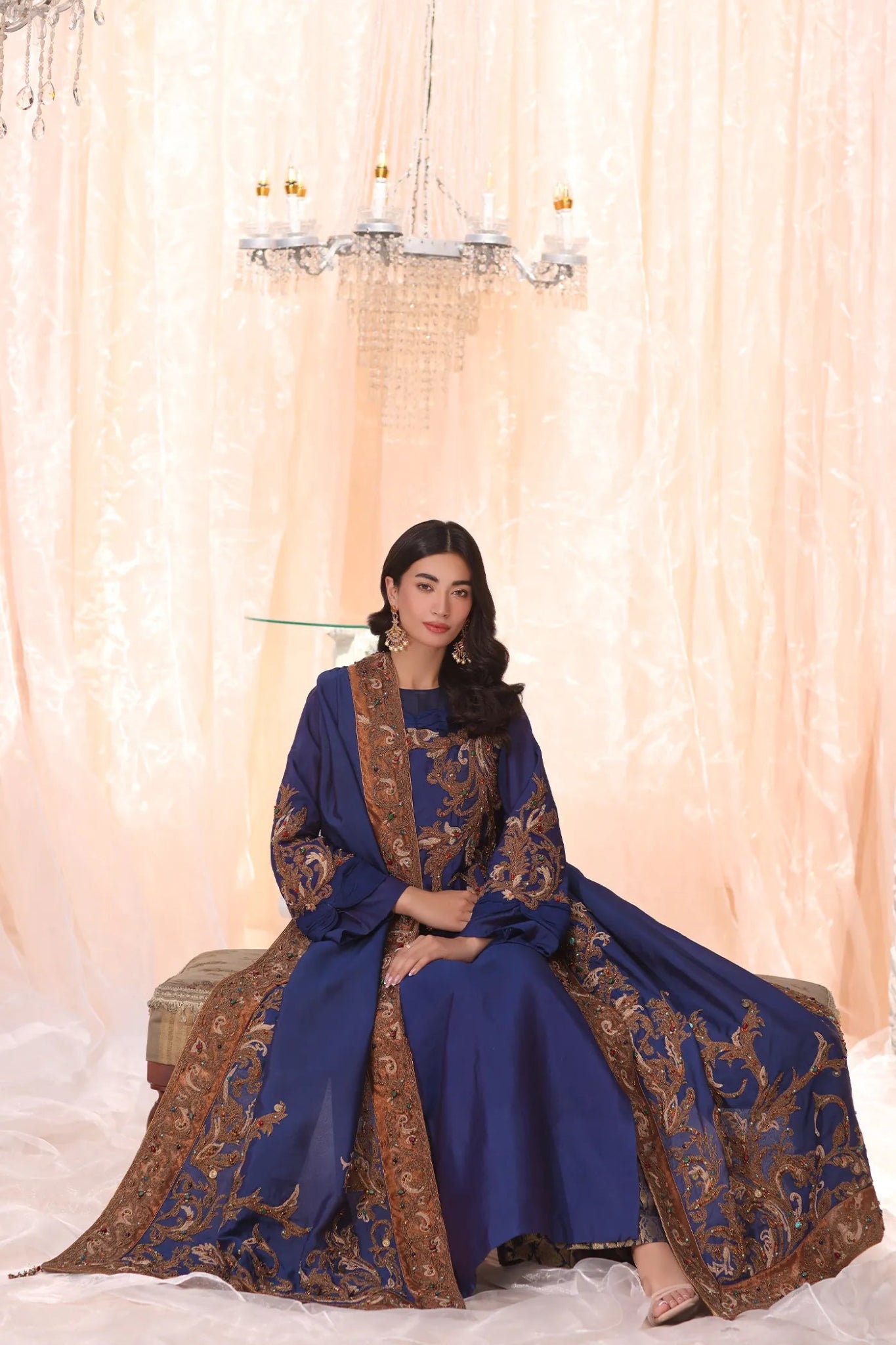 Model wearing Sapphire Empress from Musferah Saad's The Serenade collection, featuring elegant blue hues. Pakistani clothes online in UK at Signature Labels.