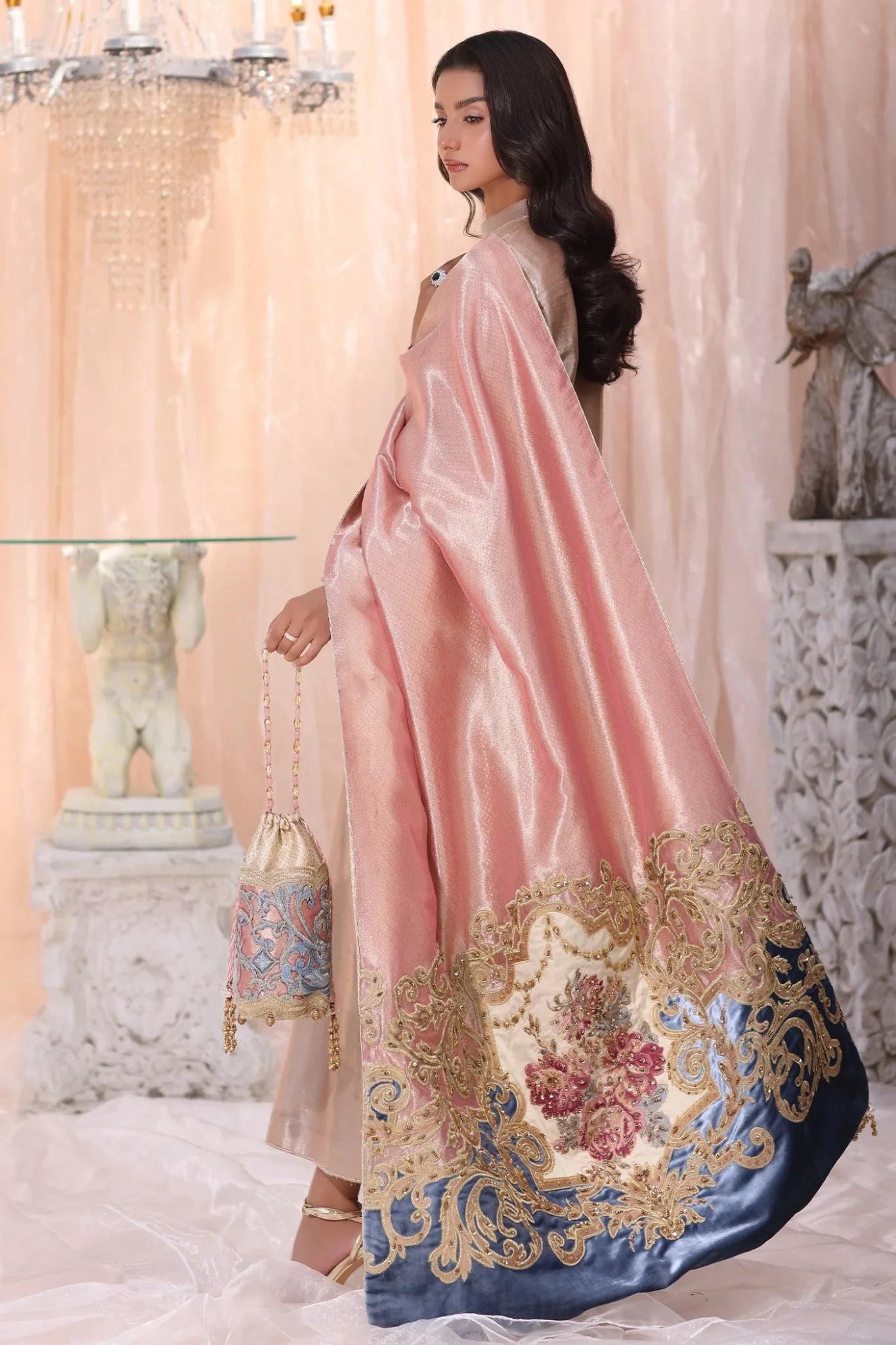 Model wearing The Queen's Tapestry from Musferah Saad's The Serenade collection in luxurious hues, perfect for weddings. Pakistani clothes online in UK at Signature Labels.