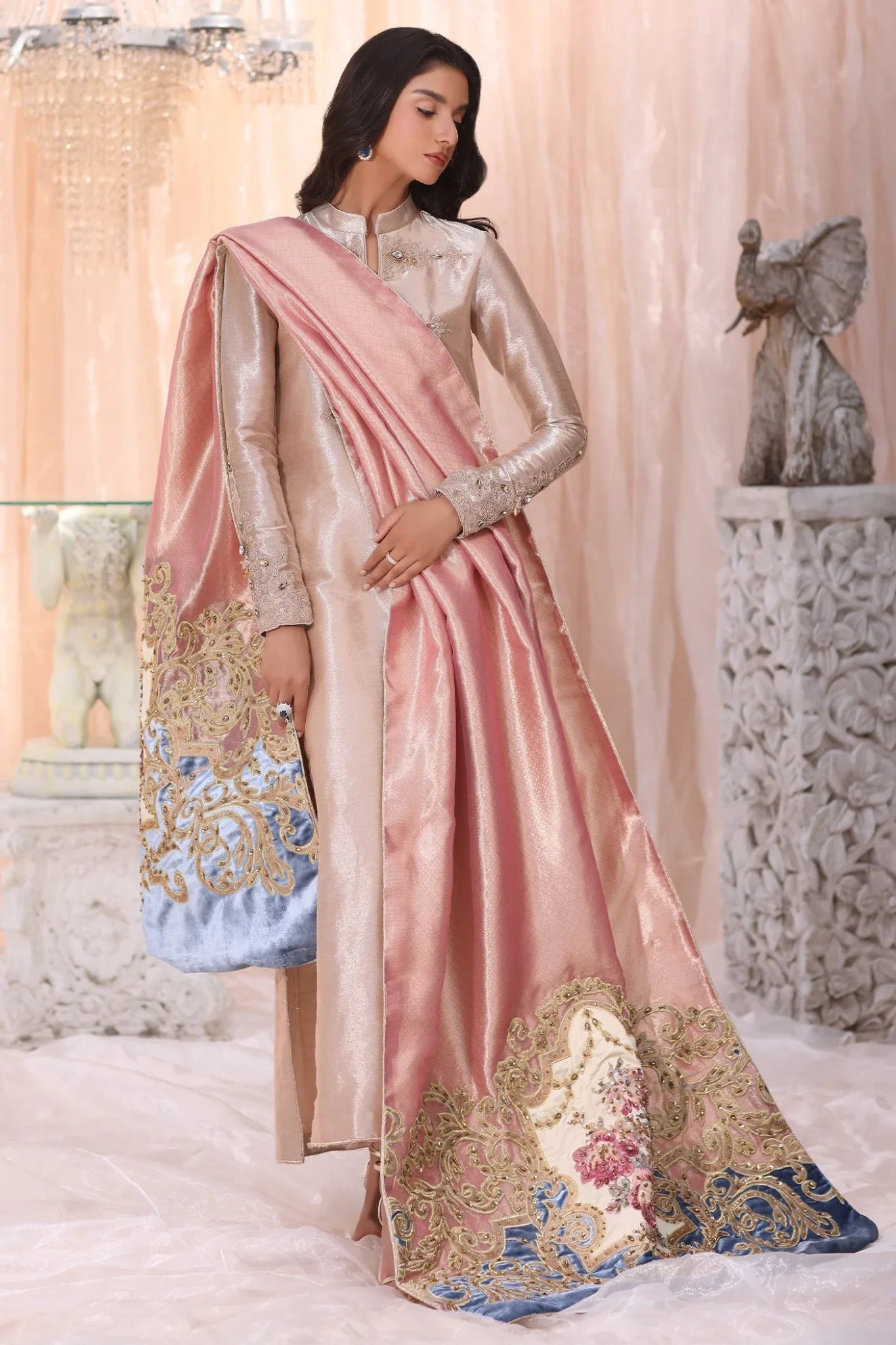 Model wearing The Queen's Tapestry from Musferah Saad's The Serenade collection in luxurious hues, perfect for weddings. Pakistani clothes online in UK at Signature Labels.