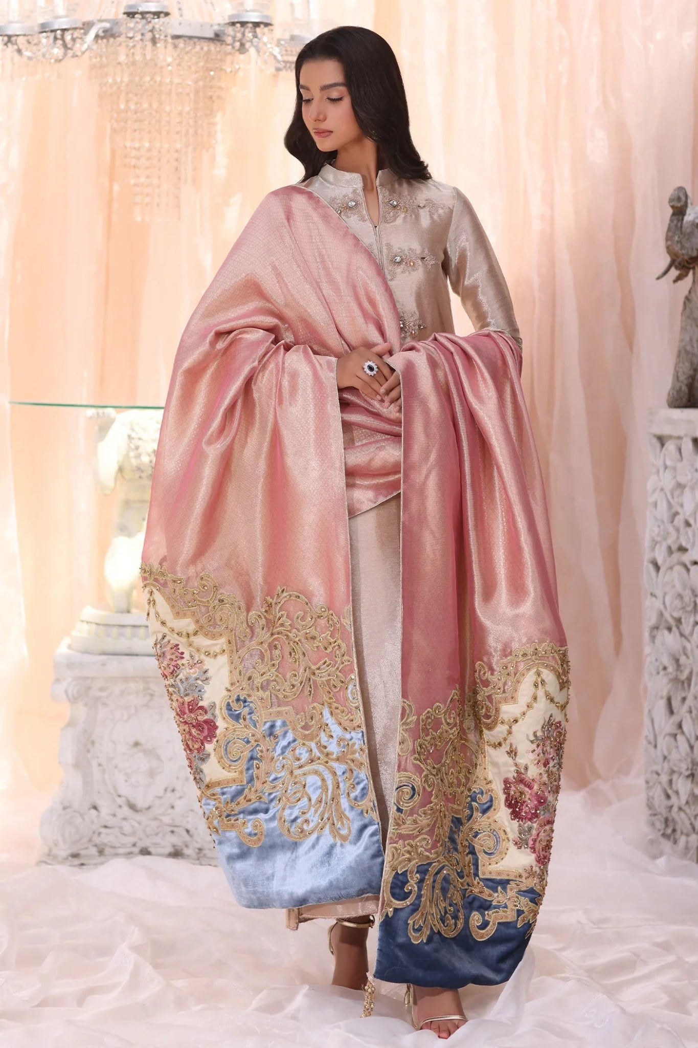 Model wearing The Queen's Tapestry from Musferah Saad's The Serenade collection in luxurious hues, perfect for weddings. Pakistani clothes online in UK at Signature Labels.