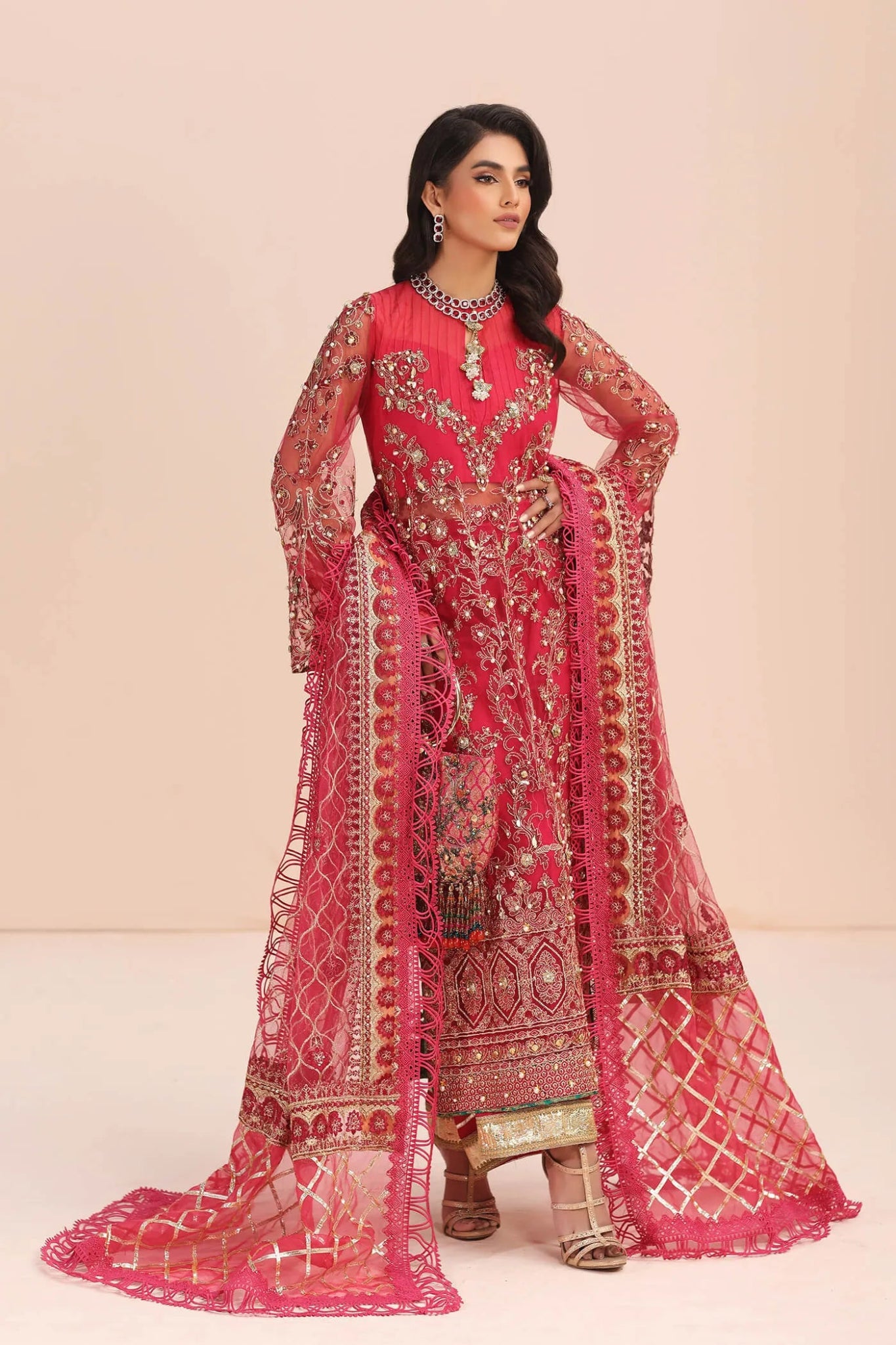 Model in Musferah Saad Fantasia pink Pakistani wedding dress, UK.