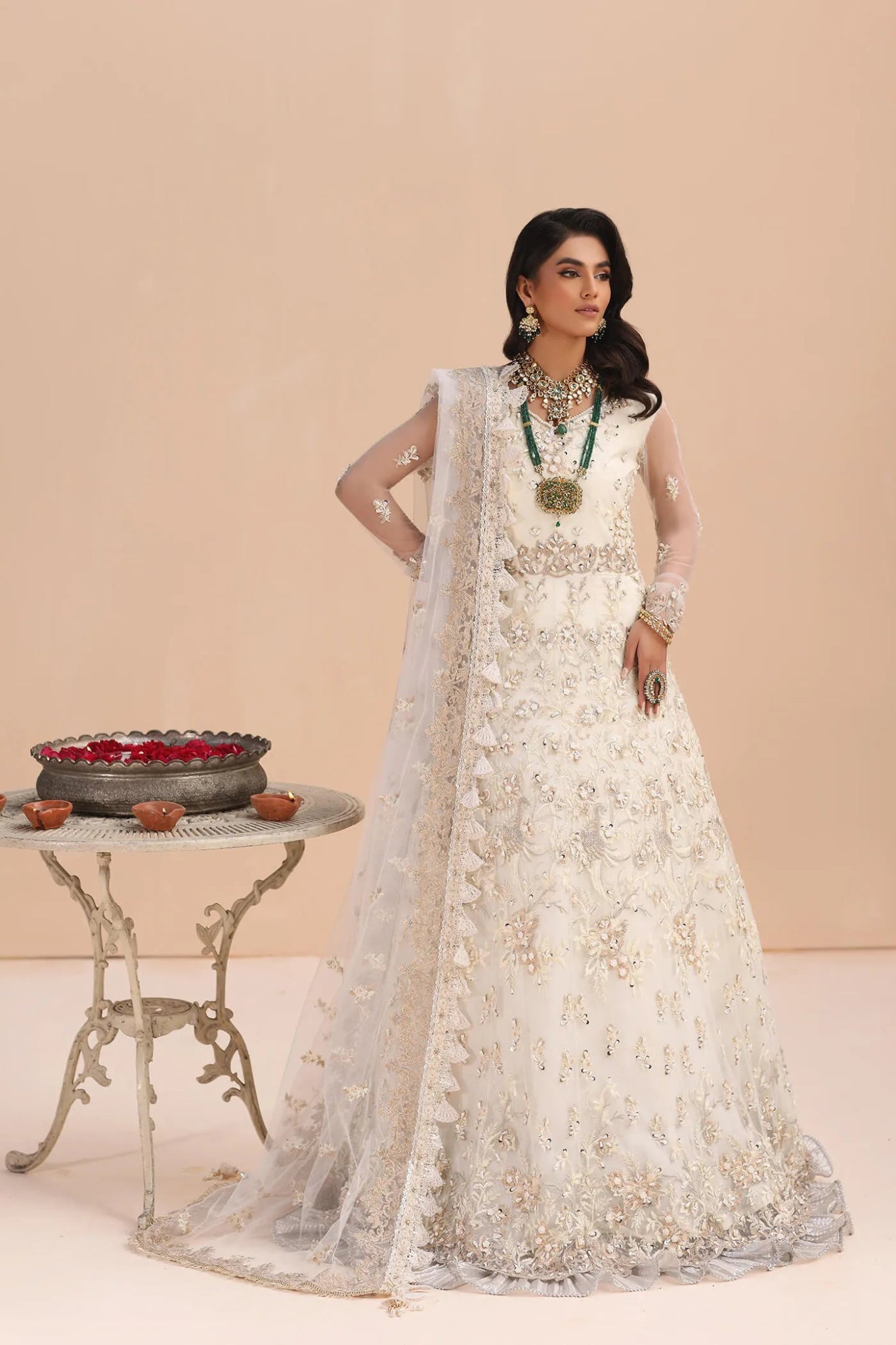 Model in Musferah Saad Ivory Elegance white Pakistani wedding dress, UK.