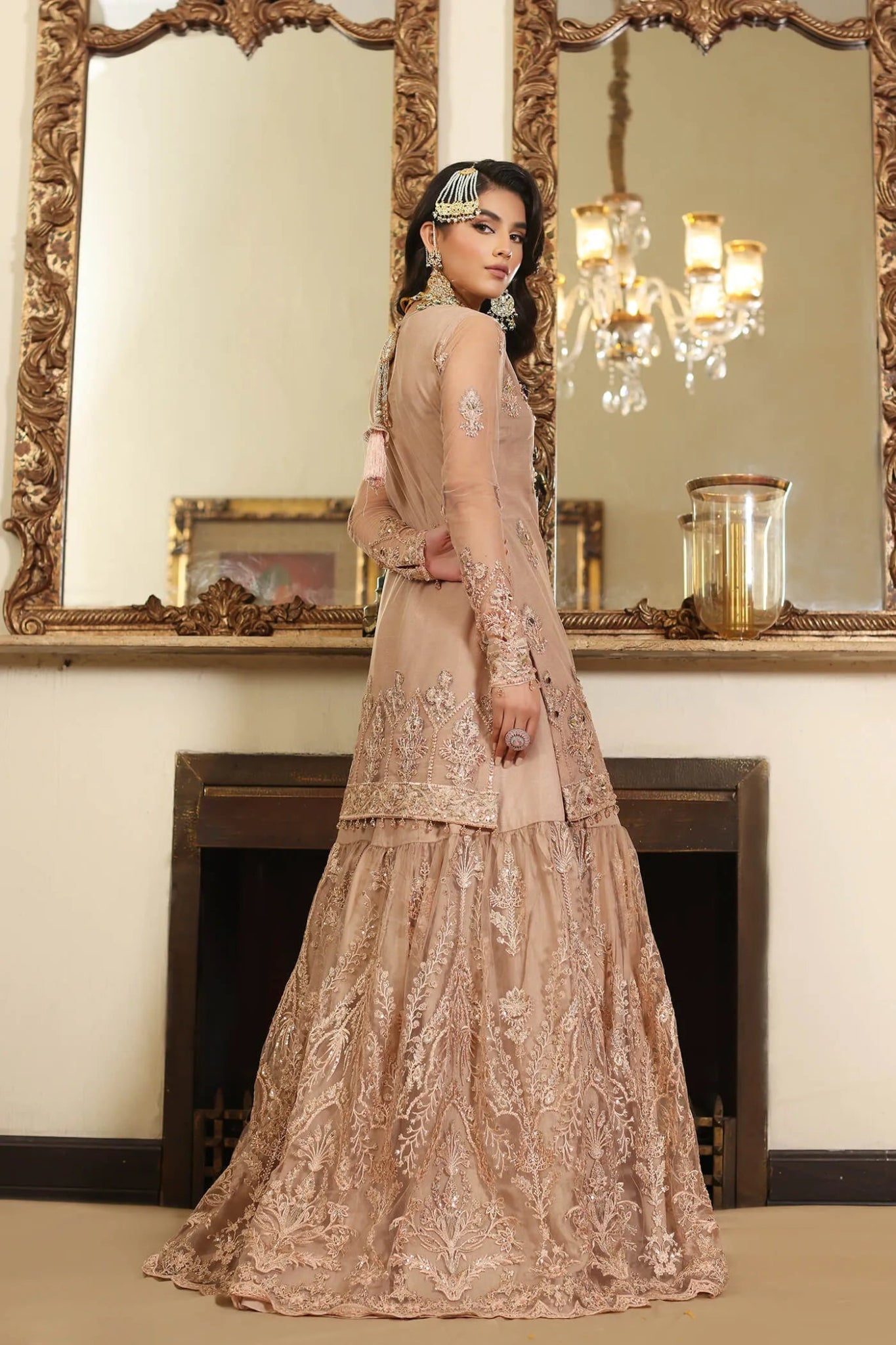 Model wearing a soft pink RADIANT ROSE dress from Musferah Saad's Wedding Secret Treasure collection, showcasing Pakistani clothes online in the UK.