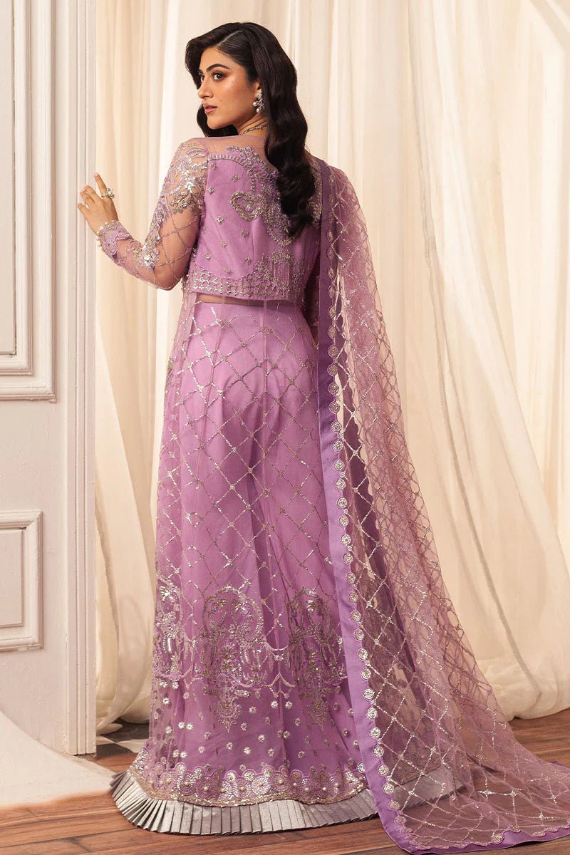 Model wearing a lavender embellished wedding formal dress, "Heather," from Mushq. Pakistani wedding clothes online in the UK.