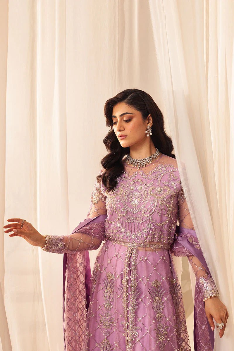 Model wearing a lavender embellished wedding formal dress, "Heather," from Mushq. Pakistani wedding clothes online in the UK.