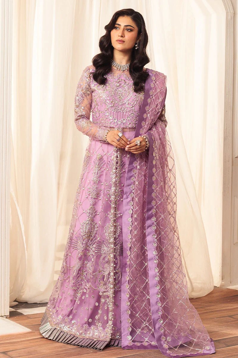 Model wearing a lavender embellished wedding formal dress, "Heather," from Mushq. Pakistani wedding clothes online in the UK.