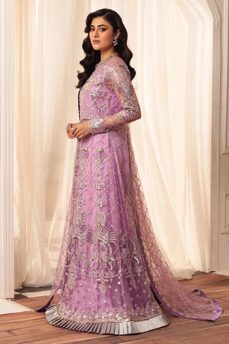 Model wearing a lavender embellished wedding formal dress, "Heather," from Mushq. Pakistani wedding clothes online in the UK.