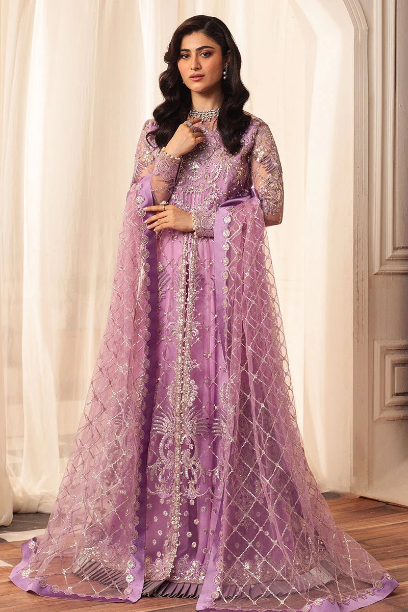 Model wearing a lavender embellished wedding formal dress, "Heather," from Mushq. Pakistani wedding clothes online in the UK.