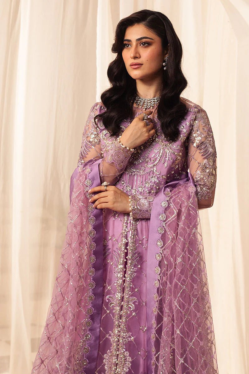 Model wearing a lavender embellished wedding formal dress, "Heather," from Mushq. Pakistani wedding clothes online in the UK.