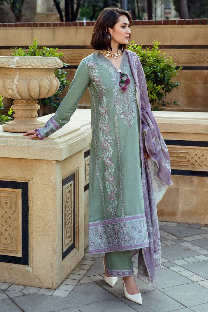 Model wearing Mushq Broadway A Walk to Remember Sweet Union, a sage green dress with intricate lavender embroidery, ideal for winter casual pret. Available for Pakistani clothes online in the UK.