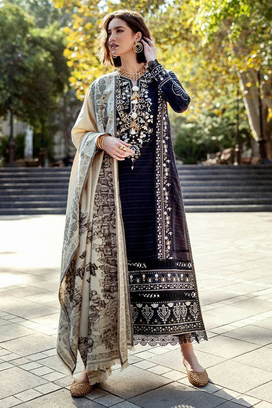 Model wearing Mushq Broadway A Walk to Remember Twisted Affection, a navy dress with intricate embroidery and a beige printed shawl, ideal for winter casual wear. Available for Pakistani clothes online in the UK.