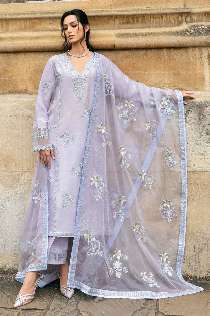 Model wearing pastel lilac dress with intricate silver and floral embroidery from Mushq, part of the Celestine The Oxford Edit 24 collection, named Asteria. Ideal for Pakistani wedding clothes online in the UK.