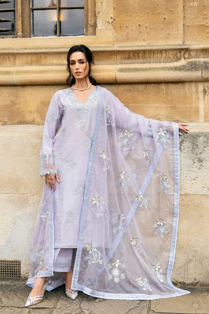 Model wearing pastel lilac dress with intricate silver and floral embroidery from Mushq, part of the Celestine The Oxford Edit 24 collection, named Asteria. Ideal for Pakistani wedding clothes online in the UK.