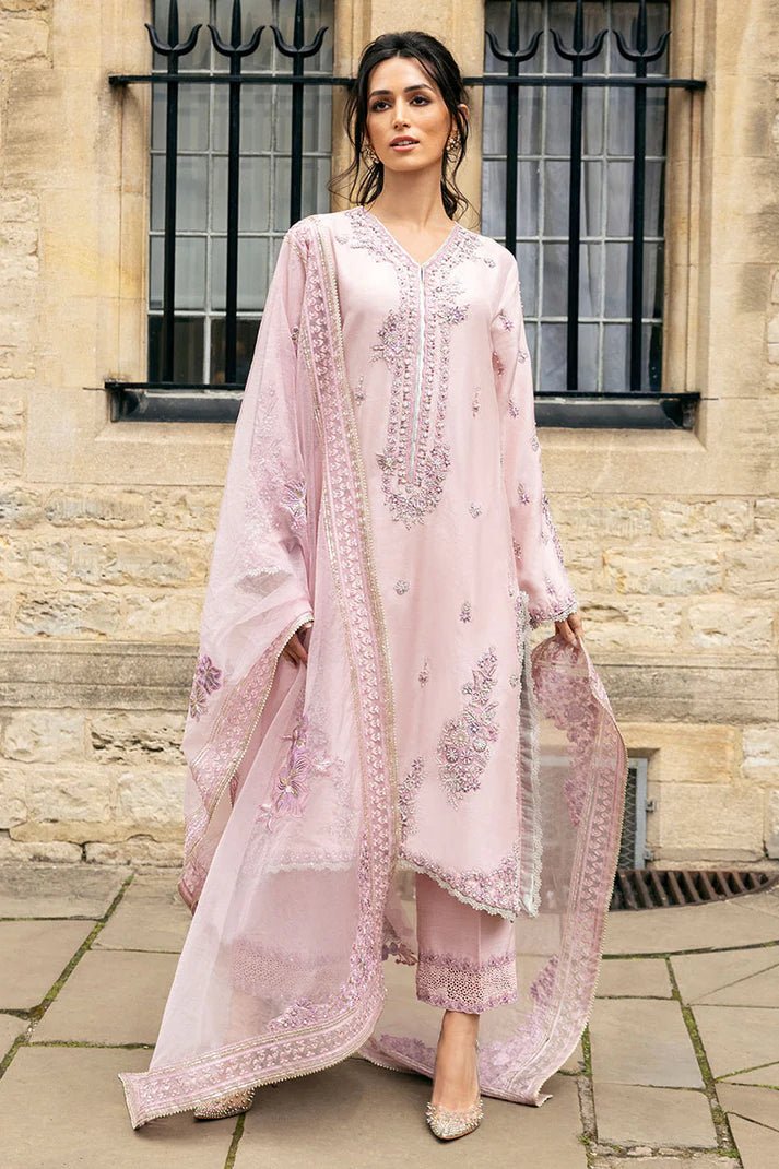 Model wearing pale pink Astrid dress from Mushq, adorned with intricate embroidery. Perfect for wedding clothes, available online in the UK.