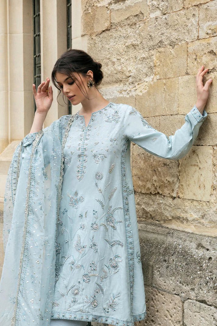 Model wearing Mushq Heavenly Breeze light blue dress from Celestine The Oxford Edit 24. Ideal for Pakistani clothes online in the UK and wedding clothes.