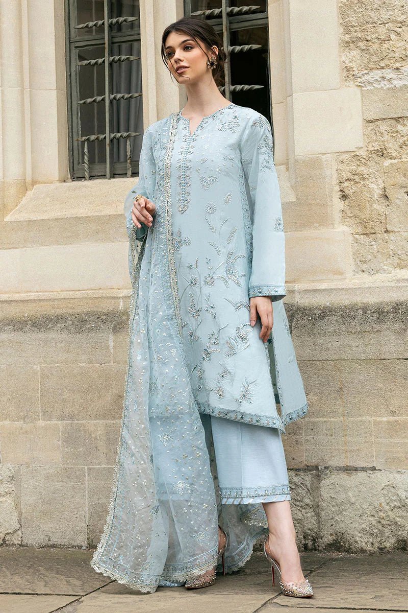 Model wearing Mushq Heavenly Breeze light blue dress from Celestine The Oxford Edit 24. Ideal for Pakistani clothes online in the UK and wedding clothes.