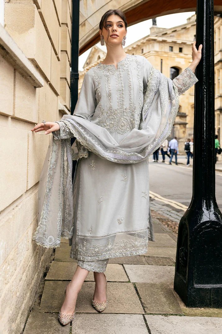 Model wearing Mushq Celestine The Oxford Edit 24 Luna Night dress in silver. Perfect for Pakistani wedding clothes online in UK.