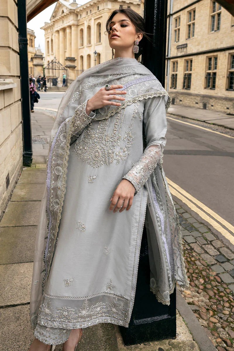 Model wearing Mushq Celestine The Oxford Edit 24 Luna Night dress in silver. Perfect for Pakistani wedding clothes online in UK.