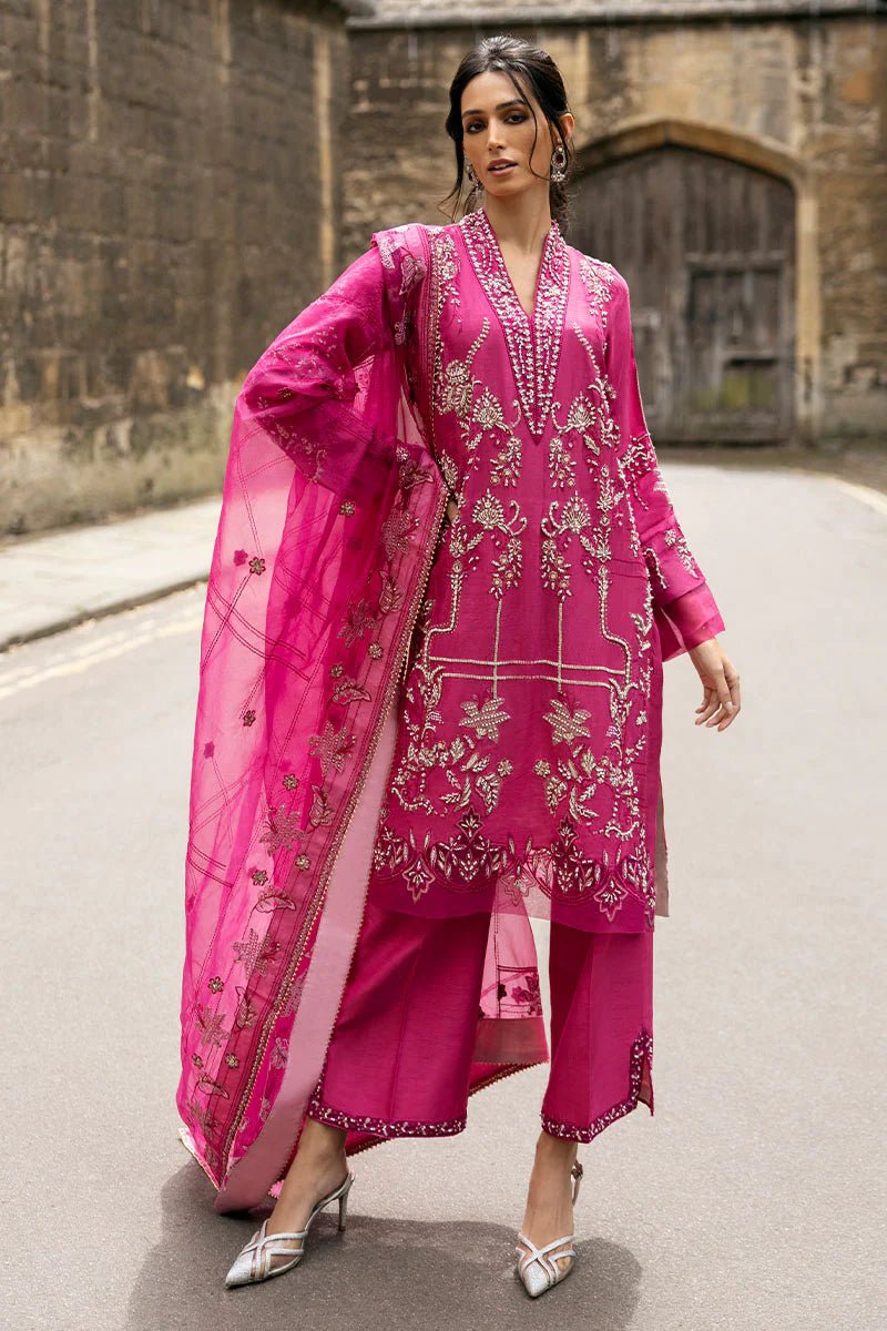 Model wearing a bright pink Oxford Whisper dress from Mushq, part of Celestine The Oxford Edit 24. Perfect Pakistani wedding clothes.