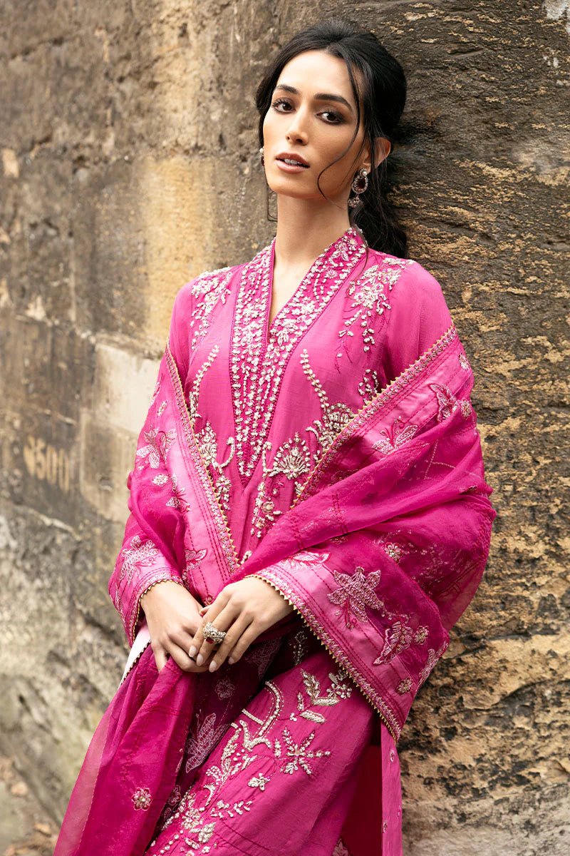 Model wearing a bright pink Oxford Whisper dress from Mushq, part of Celestine The Oxford Edit 24. Perfect Pakistani wedding clothes.