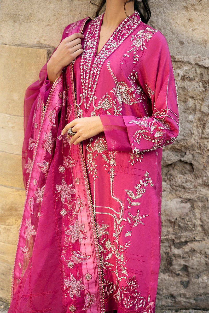 Model wearing a bright pink Oxford Whisper dress from Mushq, part of Celestine The Oxford Edit 24. Perfect Pakistani wedding clothes.