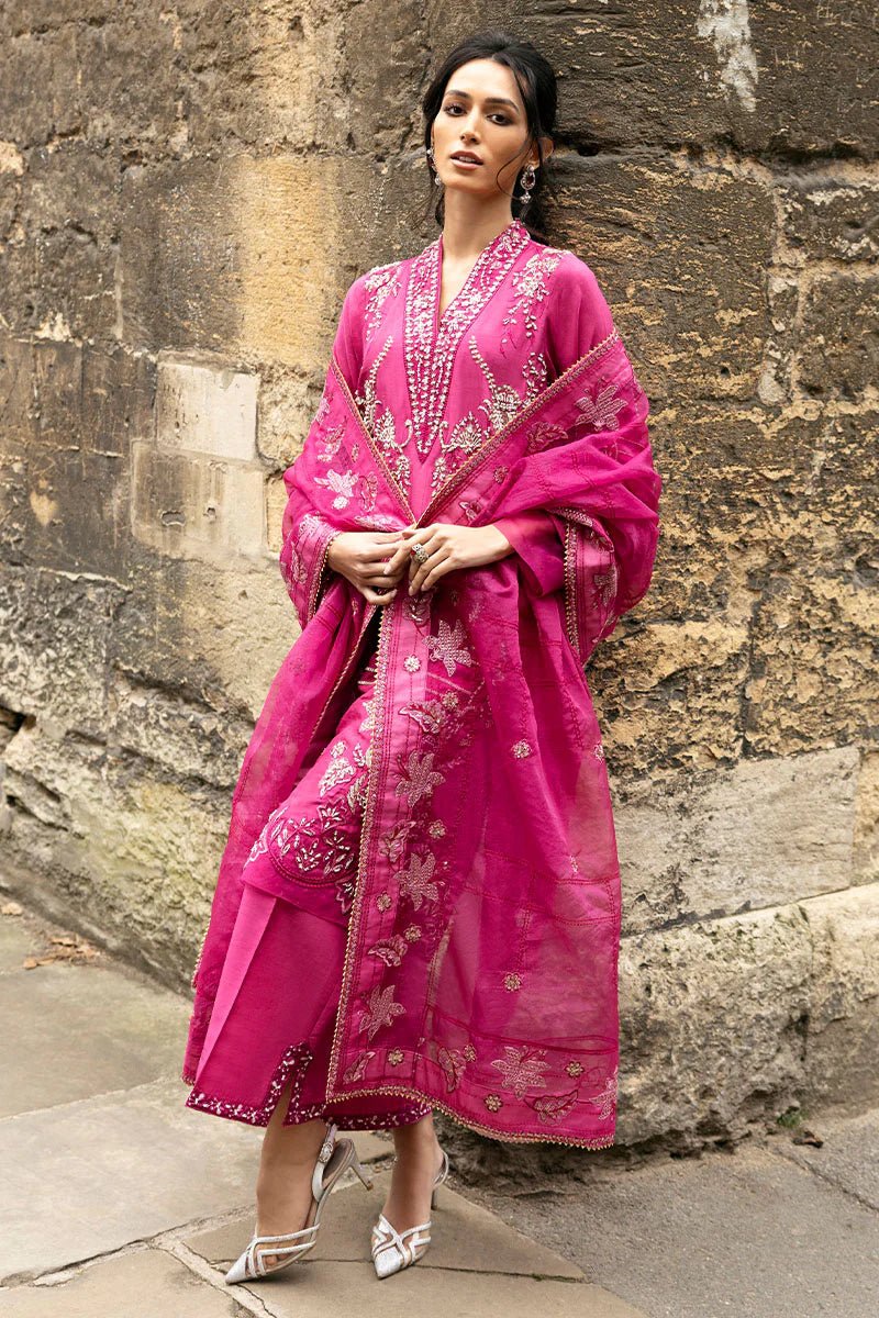 Model wearing a bright pink Oxford Whisper dress from Mushq, part of Celestine The Oxford Edit 24. Perfect Pakistani wedding clothes.