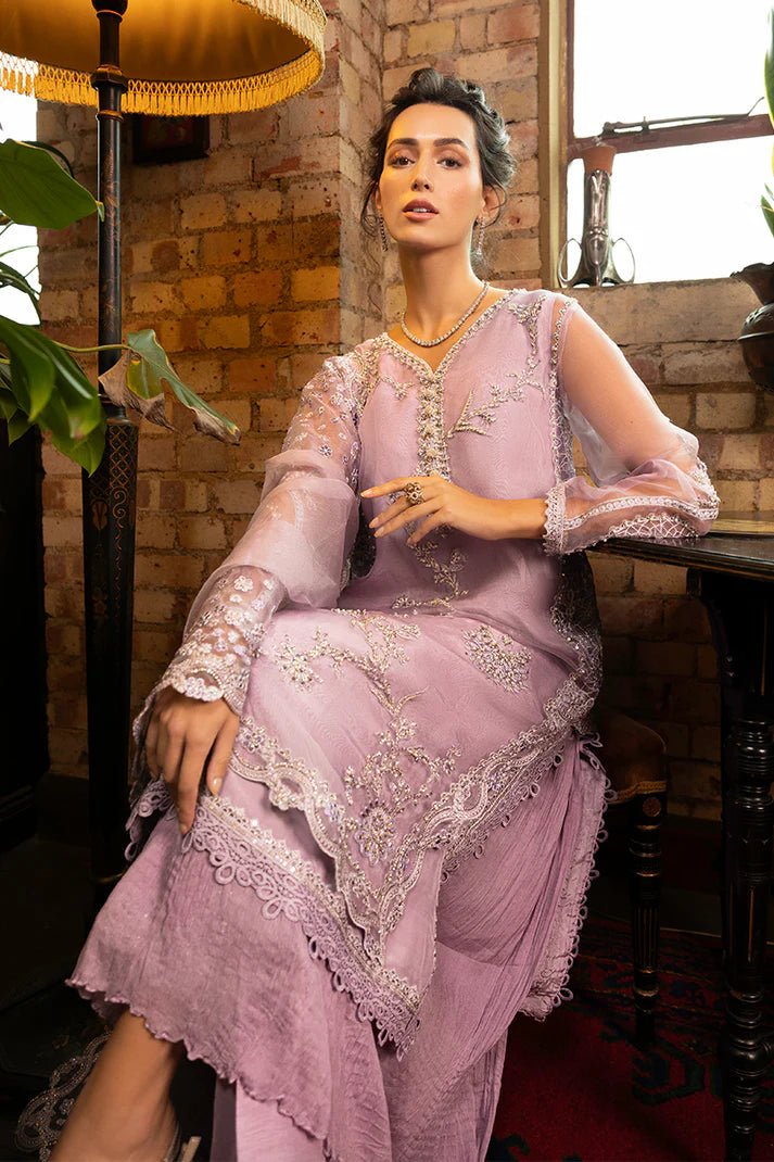 Model wearing Aisling from Mushq's Espoir Luxury Pret '24 collection in pastel peach. Luxury pret, festive, Pakistani clothes online in UK.