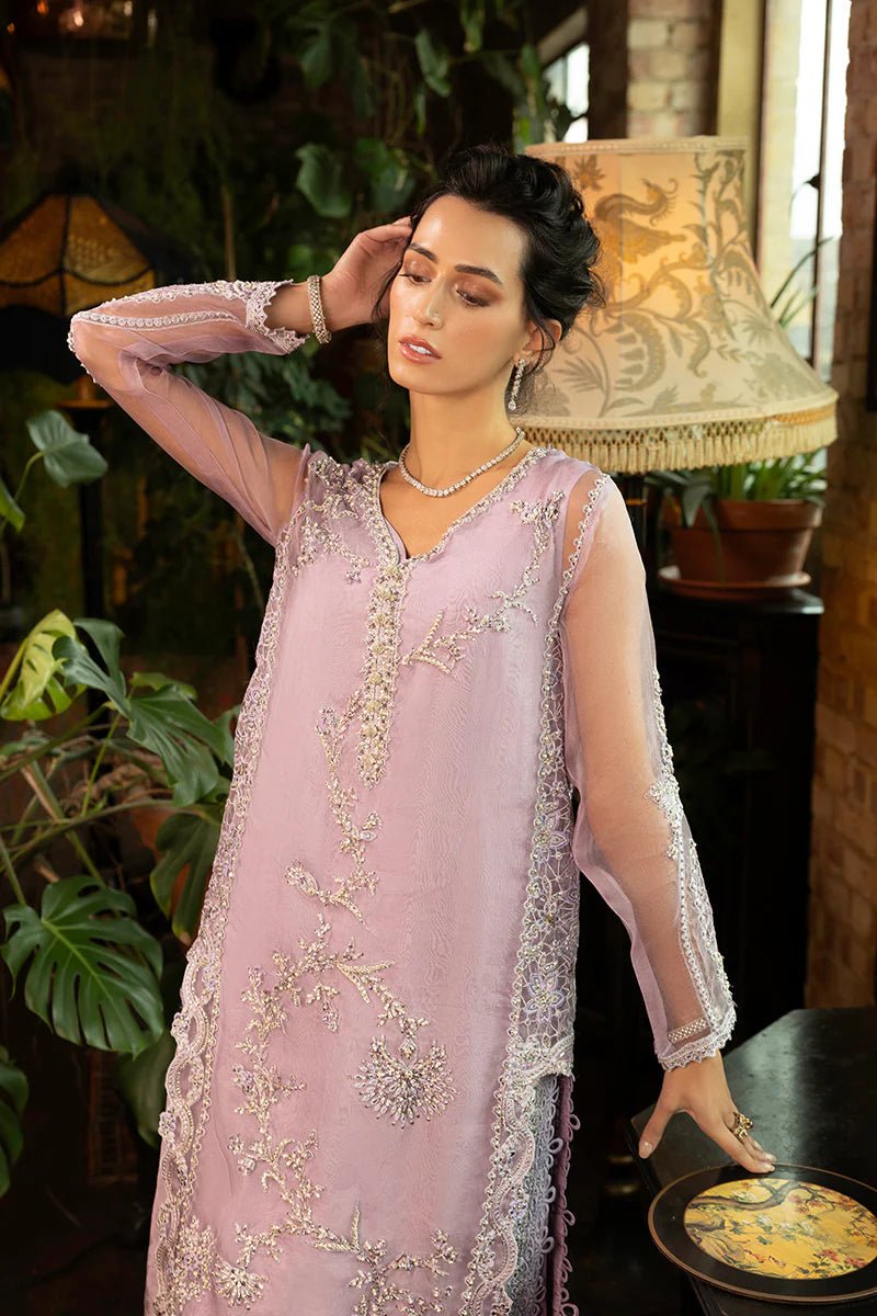 Model wearing Aisling from Mushq's Espoir Luxury Pret '24 collection in pastel peach. Luxury pret, festive, Pakistani clothes online in UK.