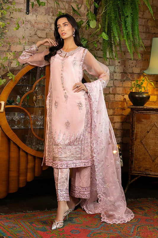 Model wearing Nadine from Mushq's Espoir Luxury Pret '24 in vibrant coral, showcasing luxury Pakistani clothes online in UK.