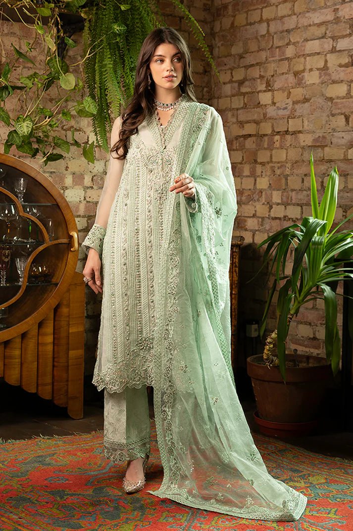 Model wearing Zora from Mushq's Espoir Luxury Pret '24 in stunning pastel hues, showcasing luxury Pakistani clothes online in UK.