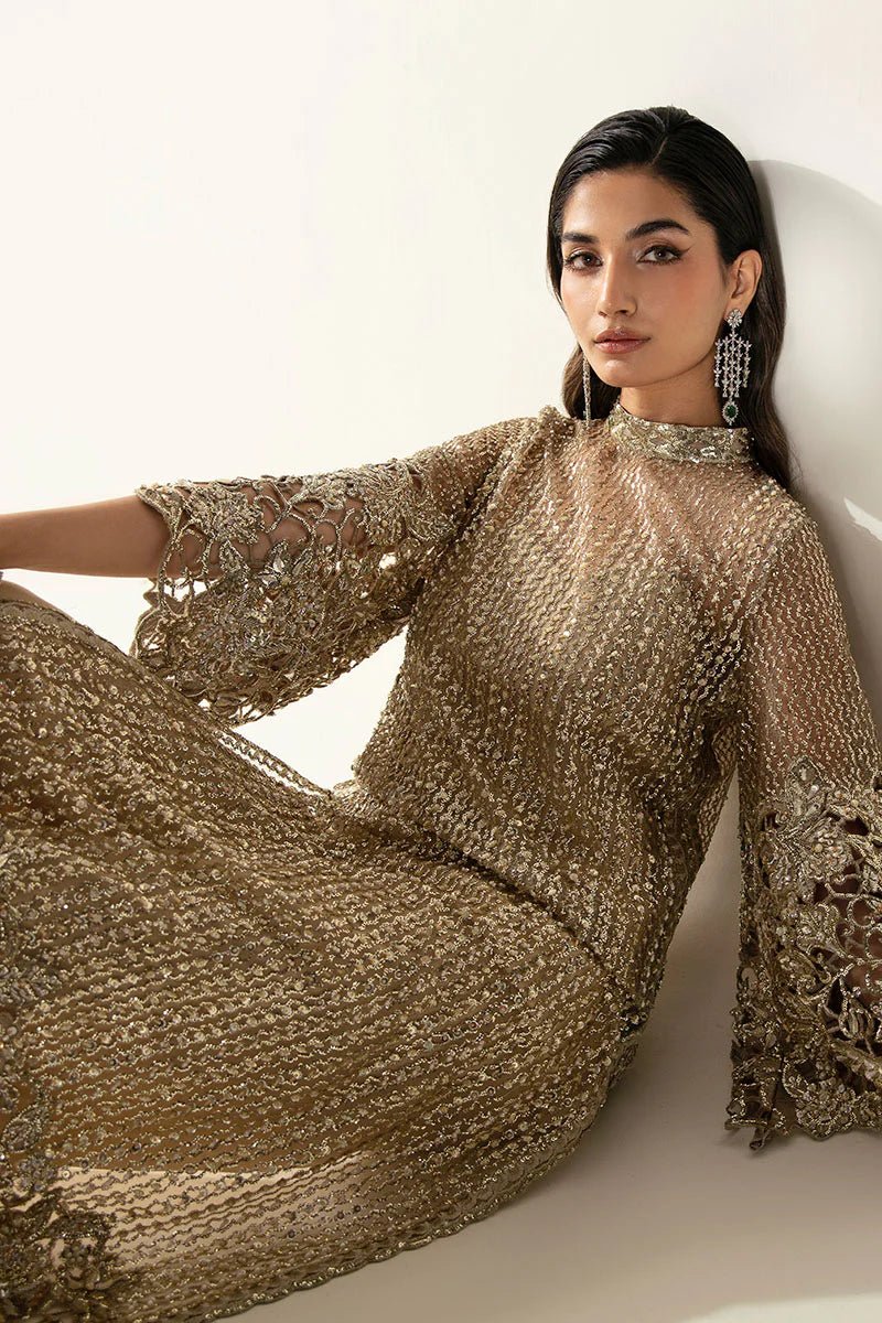 Model wearing Eve dress from Mushq's Fluer Luxury Eid Pret collection. Exquisite Pakistani clothes online in UK at Signature Labels.