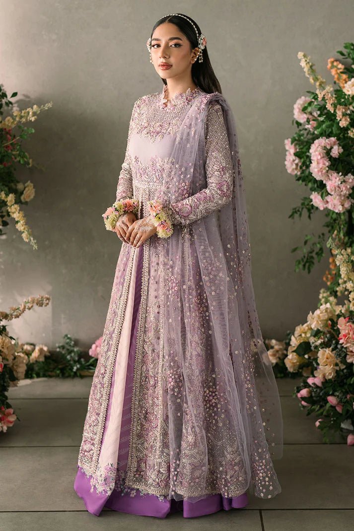 Model wearing Mushq Mastani Evening Luxury Chiffon Alyana dress in lavender, featuring intricate floral embroidery, ideal for Pakistani wedding clothes online in the UK.