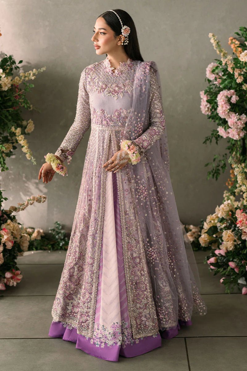 Model wearing Mushq Mastani Evening Luxury Chiffon Alyana dress in lavender, featuring intricate floral embroidery, ideal for Pakistani wedding clothes online in the UK.