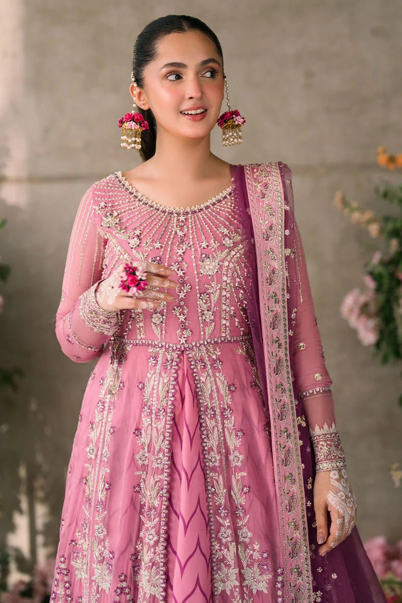 Model wearing Mushq Mastani Evening Luxury Chiffon Dua dress in shades of pink and purple, perfect for Pakistani wedding clothes online in the UK.