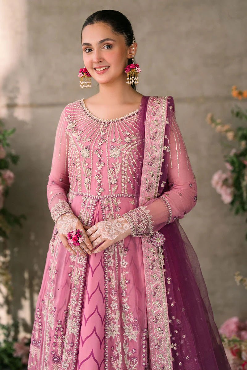 Model wearing Mushq Mastani Evening Luxury Chiffon Dua dress in shades of pink and purple, perfect for Pakistani wedding clothes online in the UK.