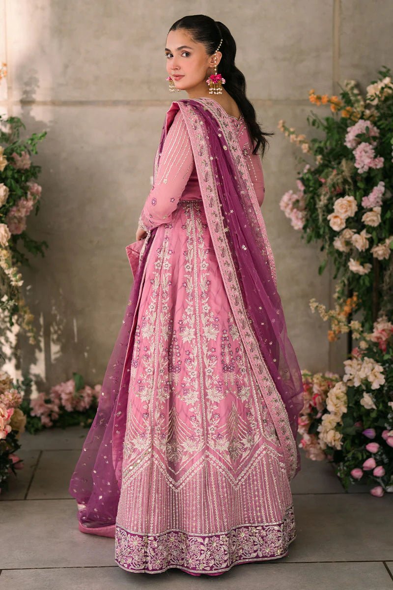 Model wearing Mushq Mastani Evening Luxury Chiffon Dua dress in shades of pink and purple, perfect for Pakistani wedding clothes online in the UK.