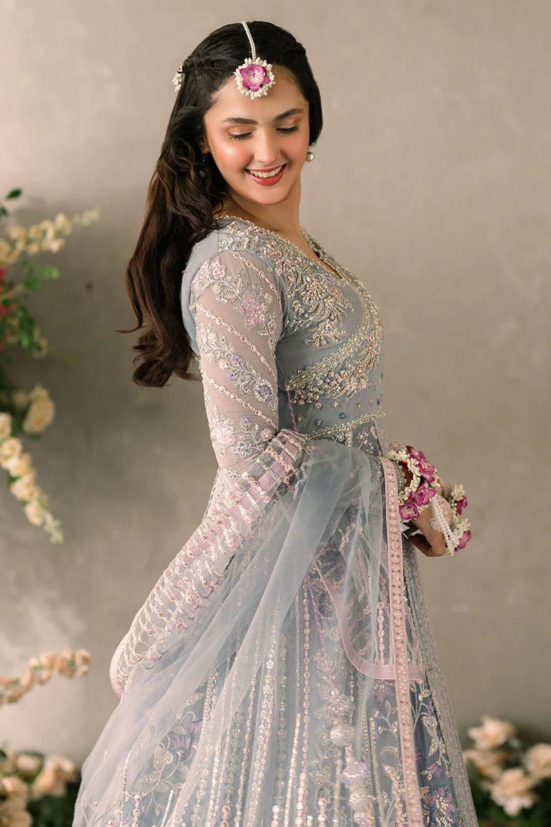 Model wearing Mushq Mastani Evening Luxury Chiffon Ezza dress in light blue with intricate embroidery, ideal for Pakistani wedding clothes online in the UK.