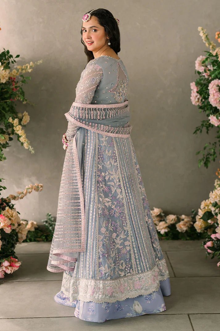 Model wearing Mushq Mastani Evening Luxury Chiffon Ezza dress in light blue with intricate embroidery, ideal for Pakistani wedding clothes online in the UK.