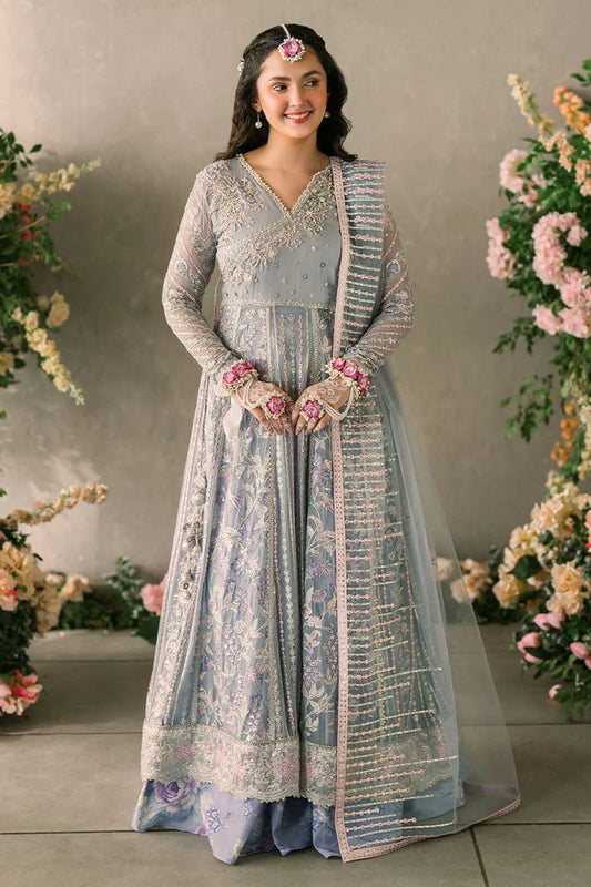 Model wearing Mushq Mastani Evening Luxury Chiffon Ezza dress in light blue with intricate embroidery, ideal for Pakistani wedding clothes online in the UK.