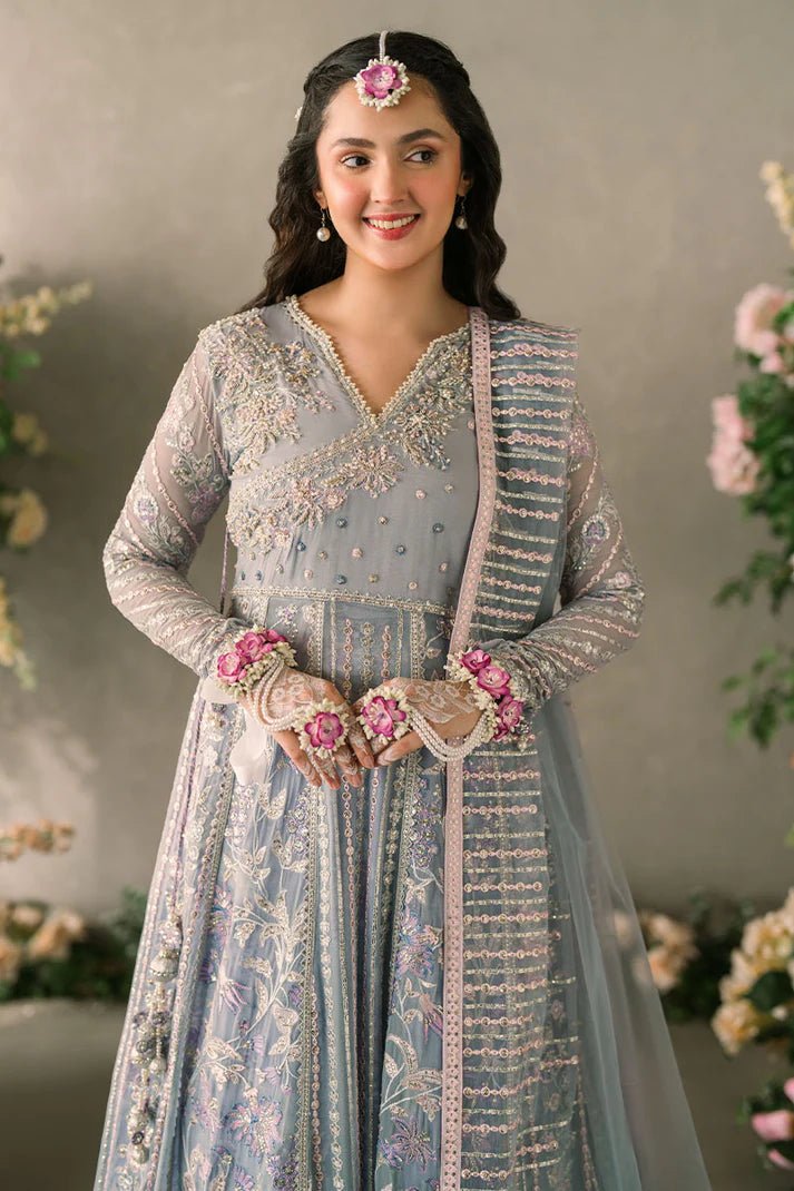 Model wearing Mushq Mastani Evening Luxury Chiffon Ezza dress in light blue with intricate embroidery, ideal for Pakistani wedding clothes online in the UK.