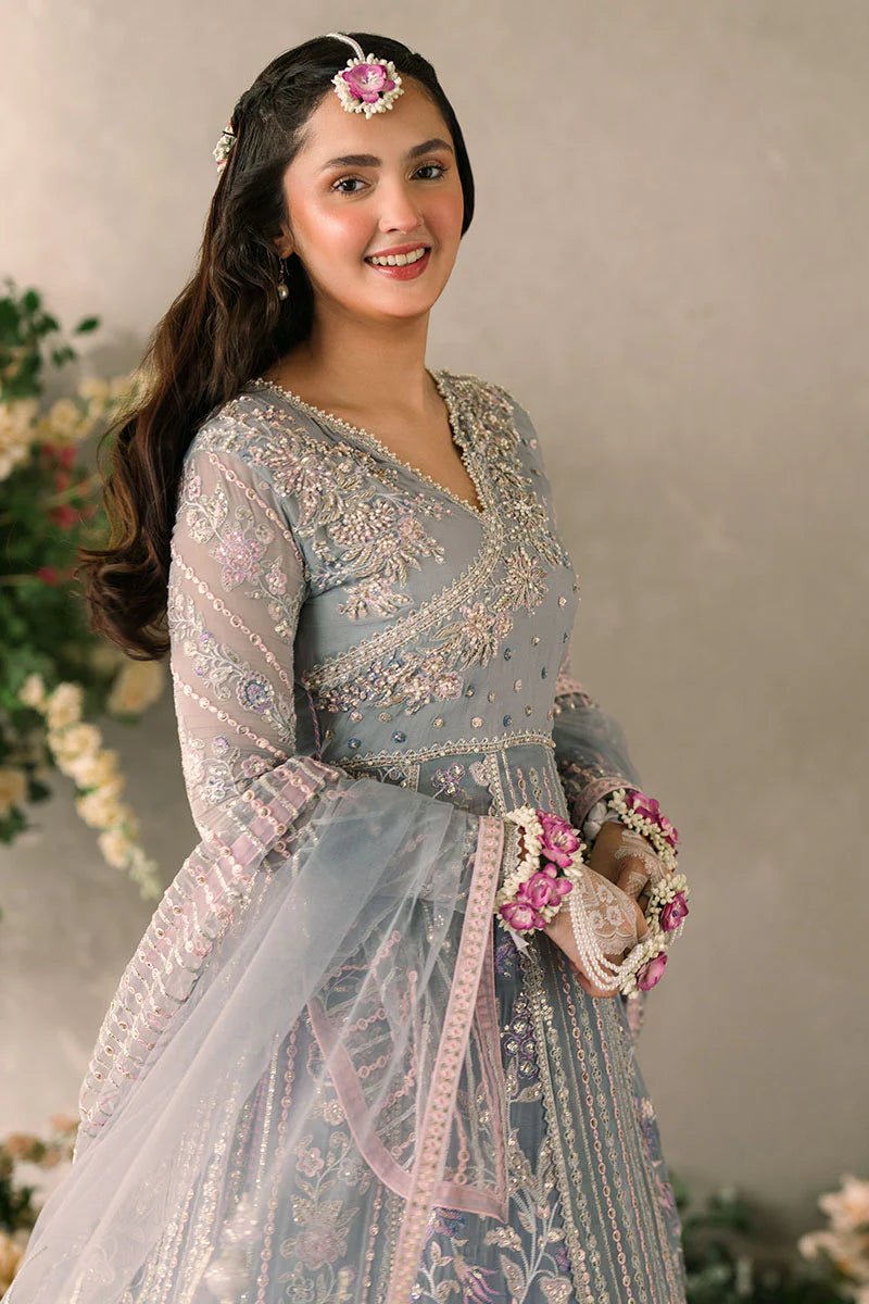 Model wearing Mushq Mastani Evening Luxury Chiffon Ezza dress in light blue with intricate embroidery, ideal for Pakistani wedding clothes online in the UK.