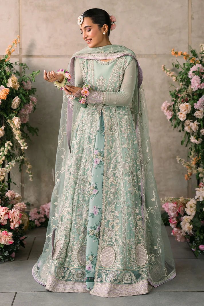 Model wearing Mushq Mastani Evening Luxury Chiffon Faiza dress in mint green with floral detailing, ideal for Pakistani wedding clothes online in the UK.