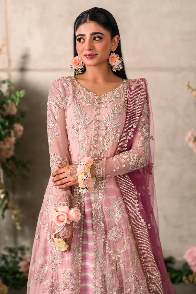 Model wearing Mushq Mastani Evening Luxury Chiffon Maisha dress in soft pink, perfect for Pakistani wedding clothes online in the UK.